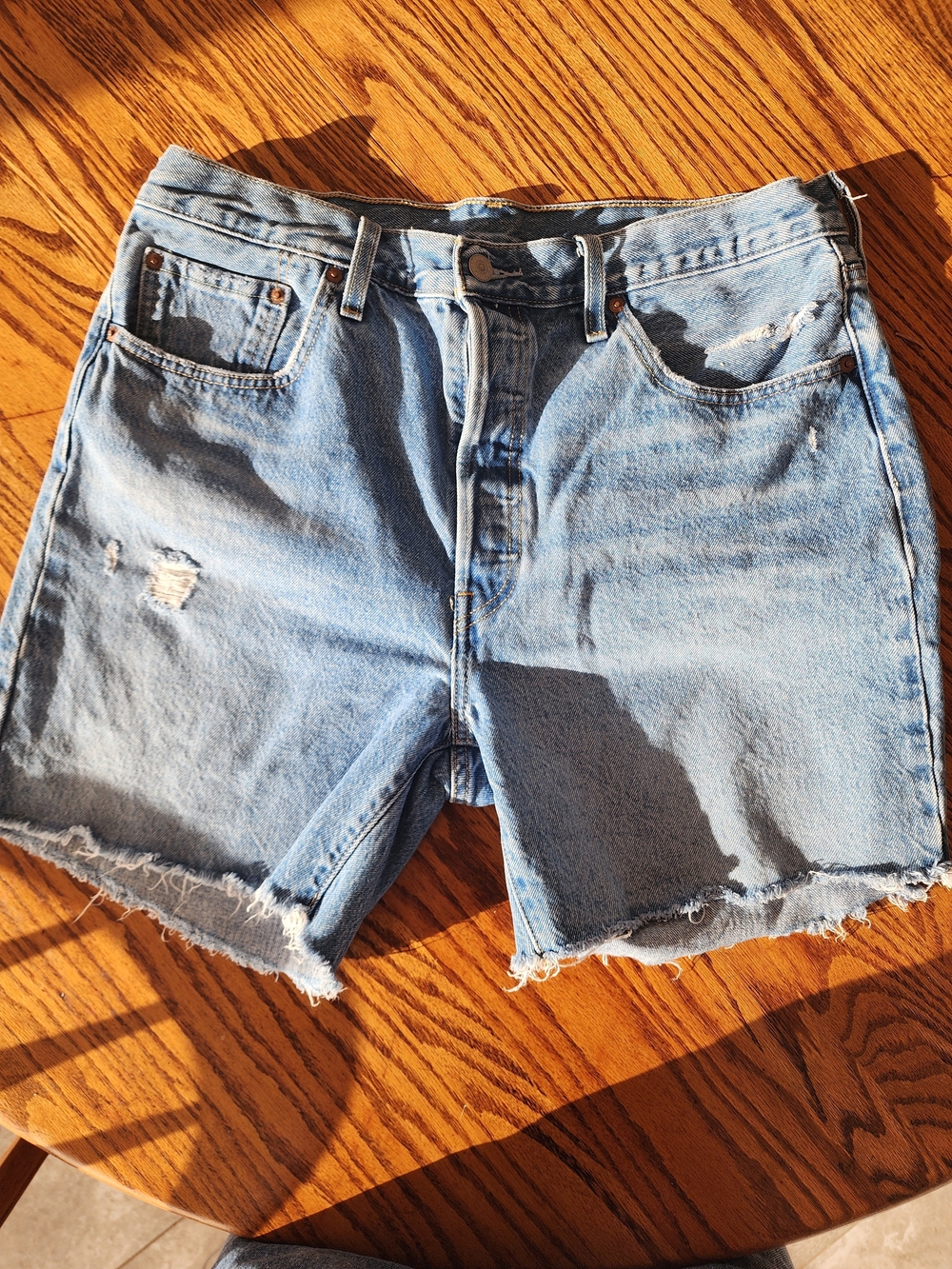 Levi's 501 Light Blue Distressed Jean Shorts